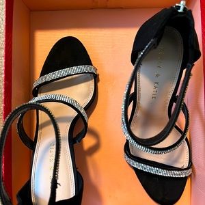 Women’s evening black dress heel. Rhinestone straps worn once.Some imperfection.